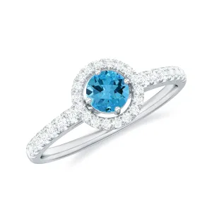 0.75 CT Swiss Blue Topaz and Diamond Halo Engagement Ring