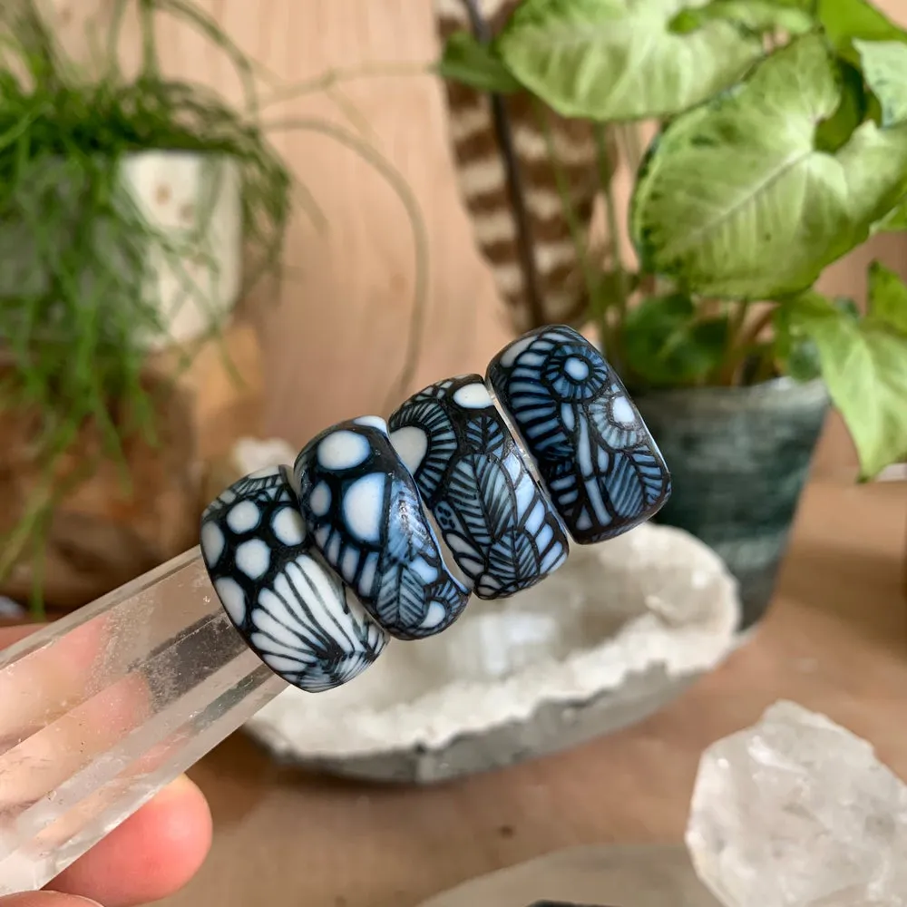 One blue and white ‘seafoam’ band ring
