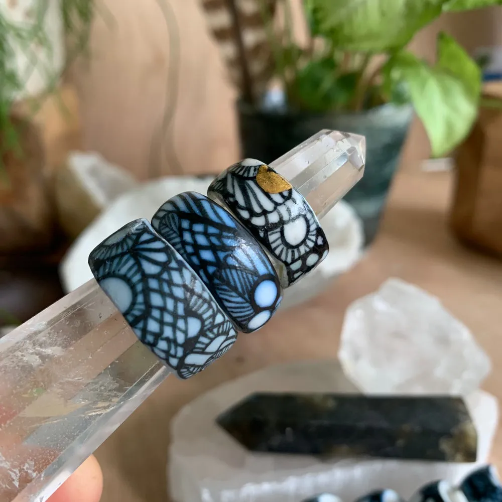 One blue and white ‘seafoam’ band ring