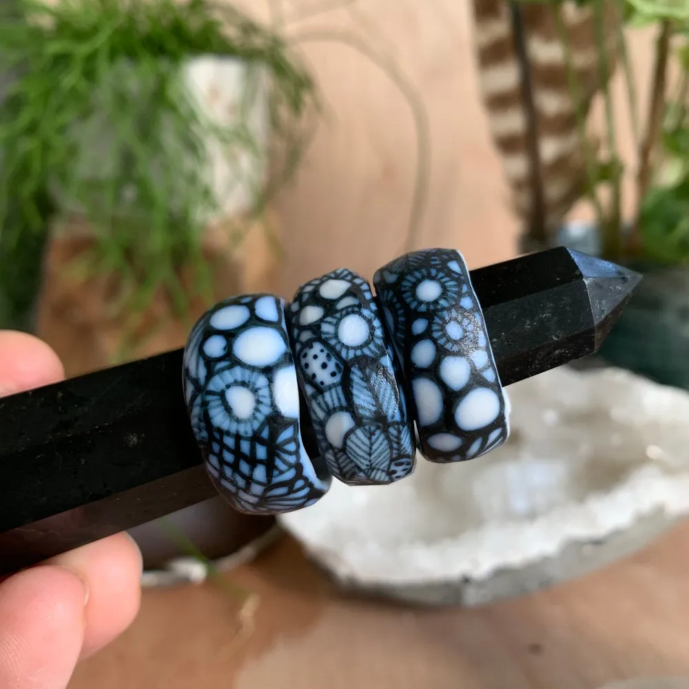 One blue and white ‘seafoam’ band ring