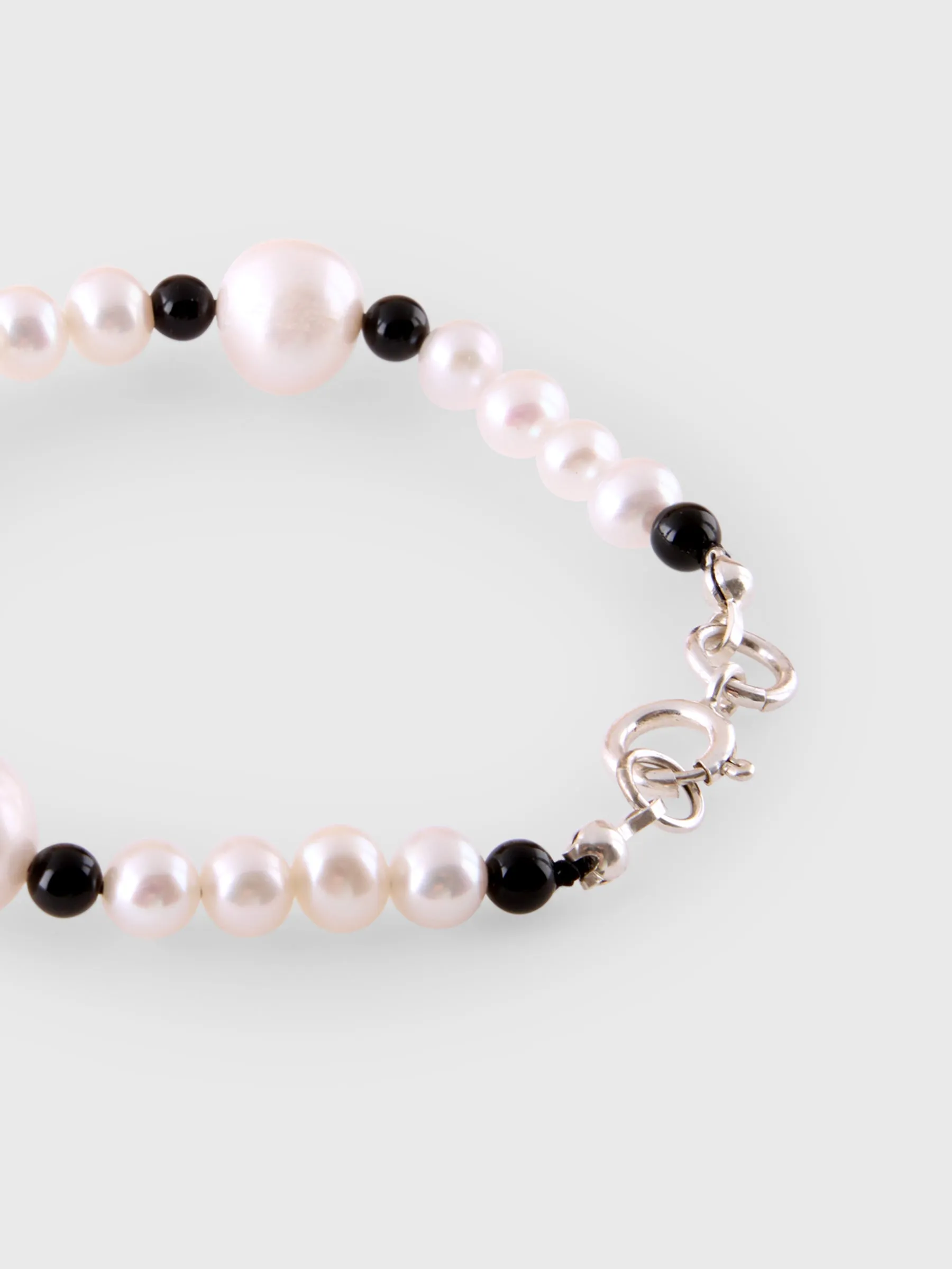 Released From Love Micro Pearl Bracelet